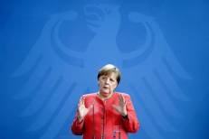 Allemagne : Angela Merkel qualifie la pandémie de Covid-19 de “mise à l’épreuve démocratique”