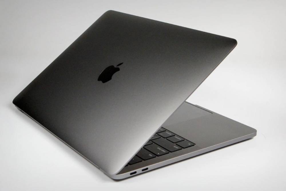 Apple dépose un brevet pour des systèmes qui réhaussent ses MacBook afin de mieux les refroidir