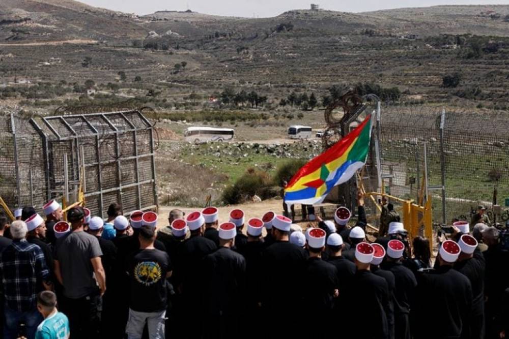 Des druzes syriens passent la ligne de cessez-le-feu sur le Golan pour un pèlerinage en Israël