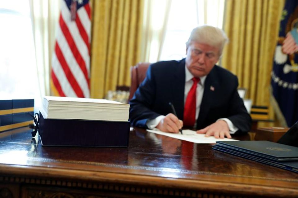 USA: Trump signe une loi budgétaire pour éviter la fermeture du gouvernement